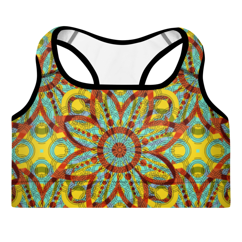 A sports bra with a kaleidoscope-like pattern in yellow, red, and blue colors, featuring a scoop neckline and wide shoulder straps.