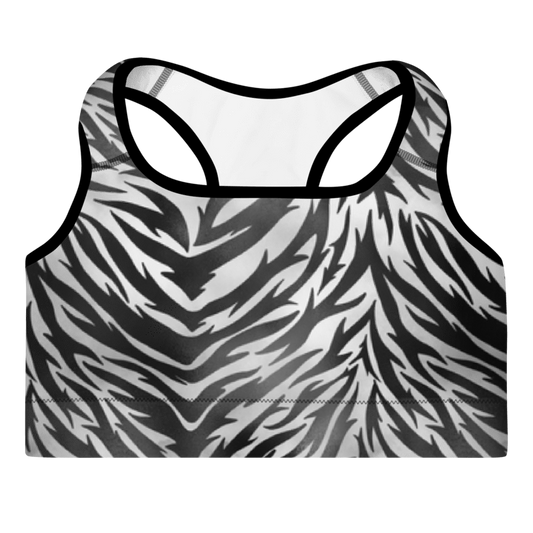A sports bra with zebra print in black and white, featuring a scoop neckline and wide shoulder straps with removable padding.