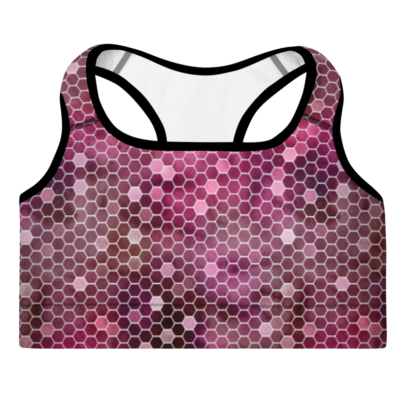A sports bra with a honeycomb pattern in red and purple colors, featuring a scoop neckline, wide shoulder straps, and a racerback design.