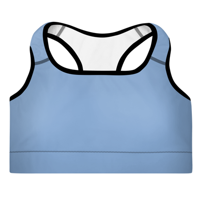 A light blue padded sports bra with a scoop neckline, racerback design, and wide shoulder straps with support material.