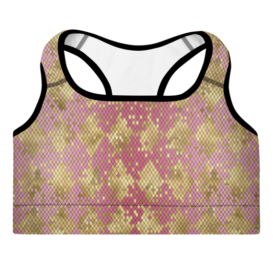 A sports bra with pink and gold snake-like print, featuring a scoop neckline, racerback design, and shoulder straps.