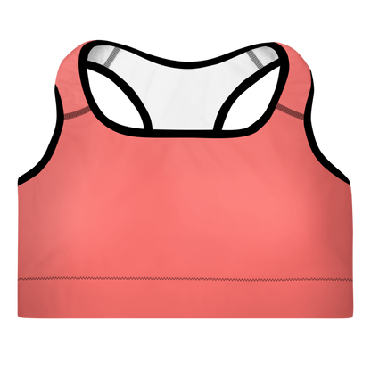 A sports pink padded bra with adjustable straps and a scoop neckline.