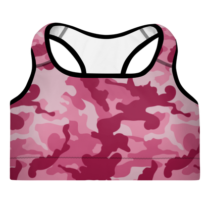 A sports bra with a camouflage pattern in dark pink and white colors, featuring a scoop neckline and wide shoulder straps with support material.