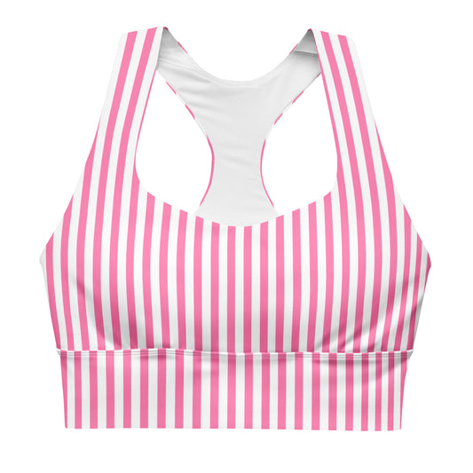 A sports bra with white and pink stripes, featuring a longline silhouette, with no visible brand markings.