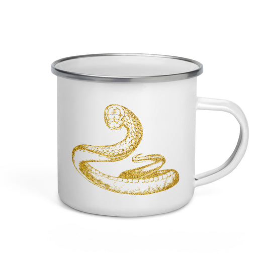 A white enamel mug with a silver rim, featuring a golden snake design.