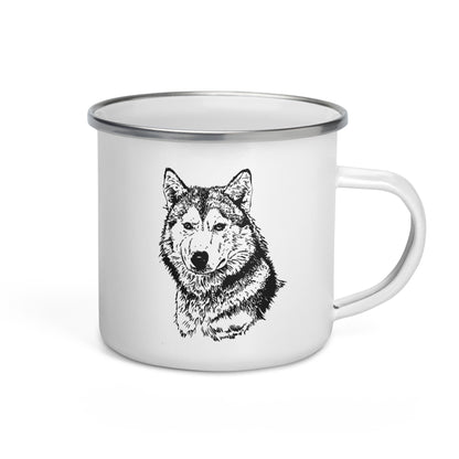A white enamel mug with a hand-drawn monochrome wolf design.