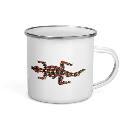 A white enamel mug with a silver rim, featuring a colorful tribal painting of a crocodile on the side.