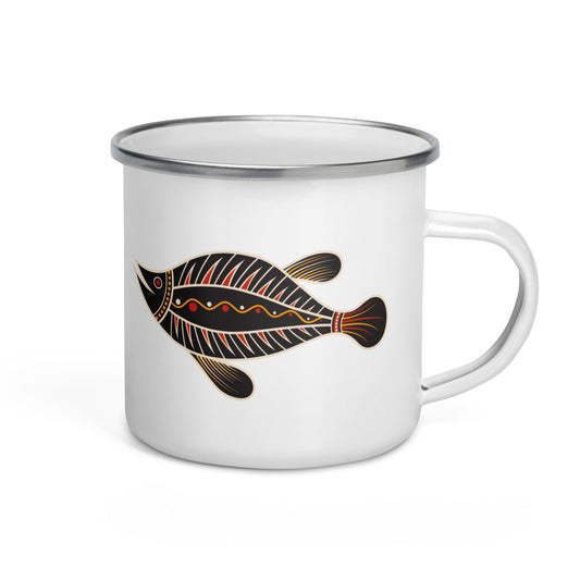 A white enamel mug with a silver rim, featuring a black and orange tribal painting of a fish figure on the side.