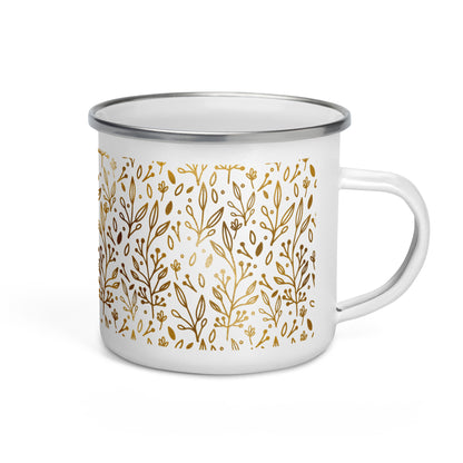 A white enamel mug with a silver rim, featuring a geometric golden pattern of intertwined plant branches.